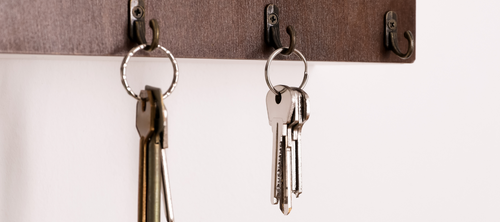 Keys hanging on a wall rack